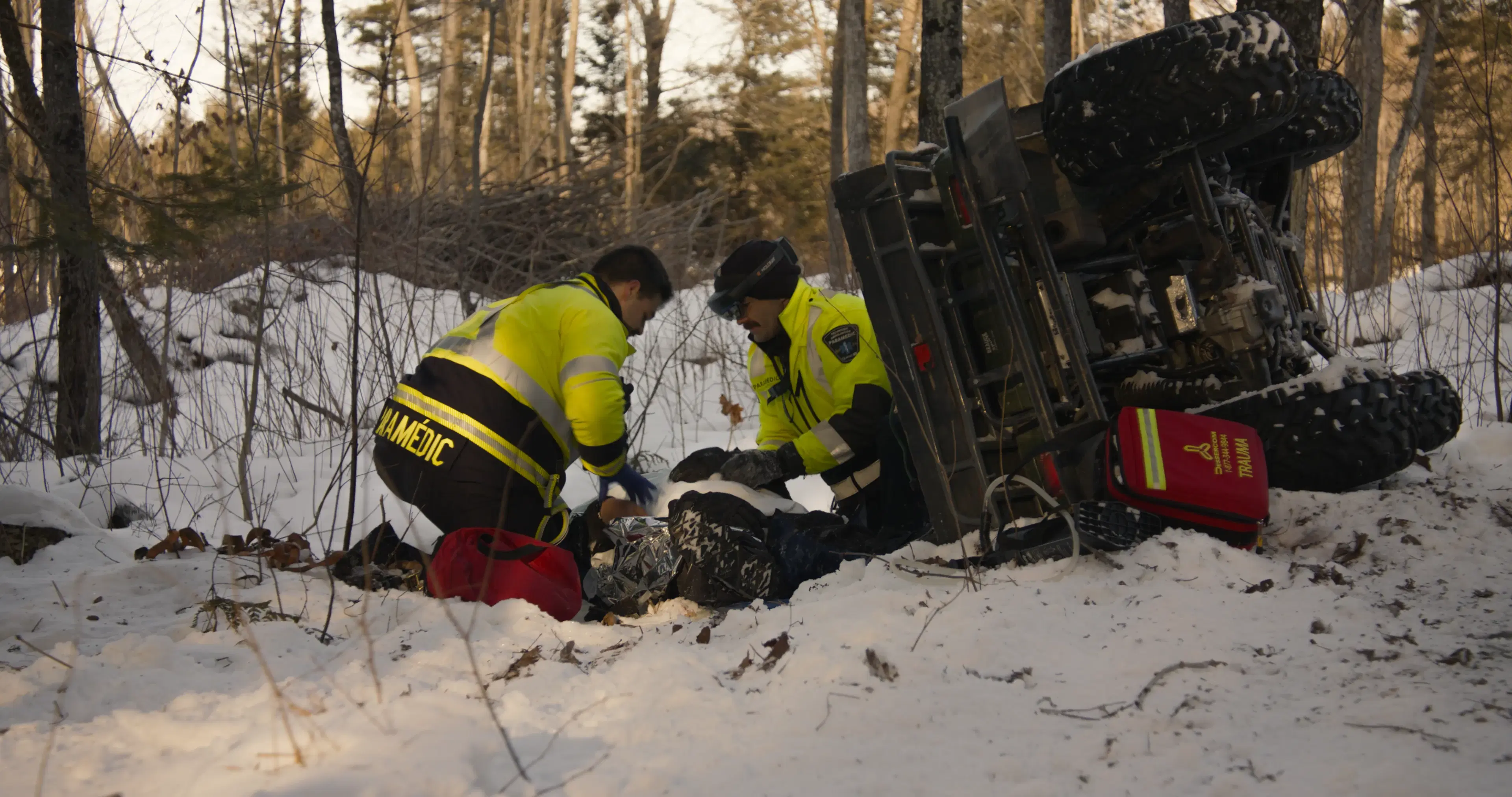 Emergency team at scene with remote specialist support